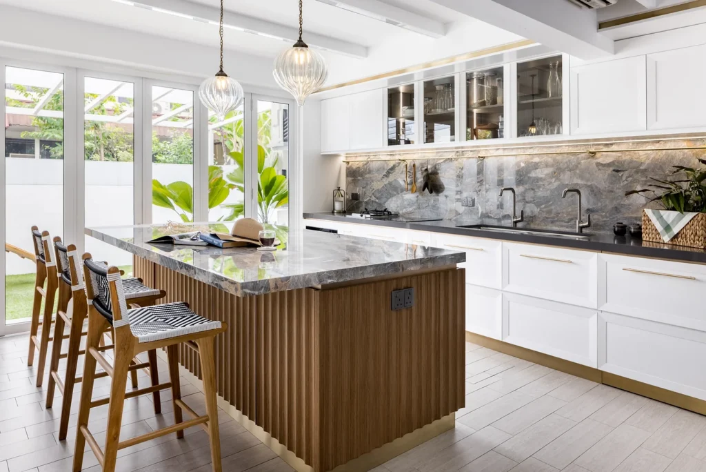 Kitchen with stools and backyard area